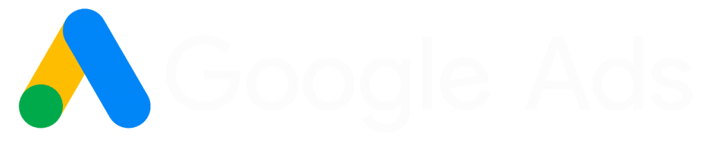 Google Adsのロゴは、左側に青、黄、緑でデザインされた「A」の文字、右側にライトグレーのテキストで「Google Ads」の文字が配されている。.